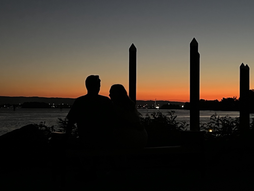 silhouette of couple at dusk
