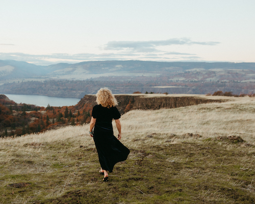 woman on mountain plateau
