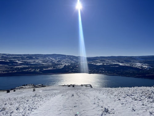 sun shining on lake